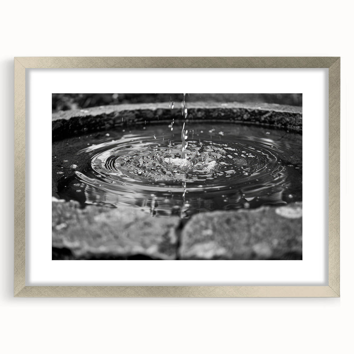 Textured art print featuring abstract design in muted gray and blue tones, framed in silver, ideal for bedroom art.