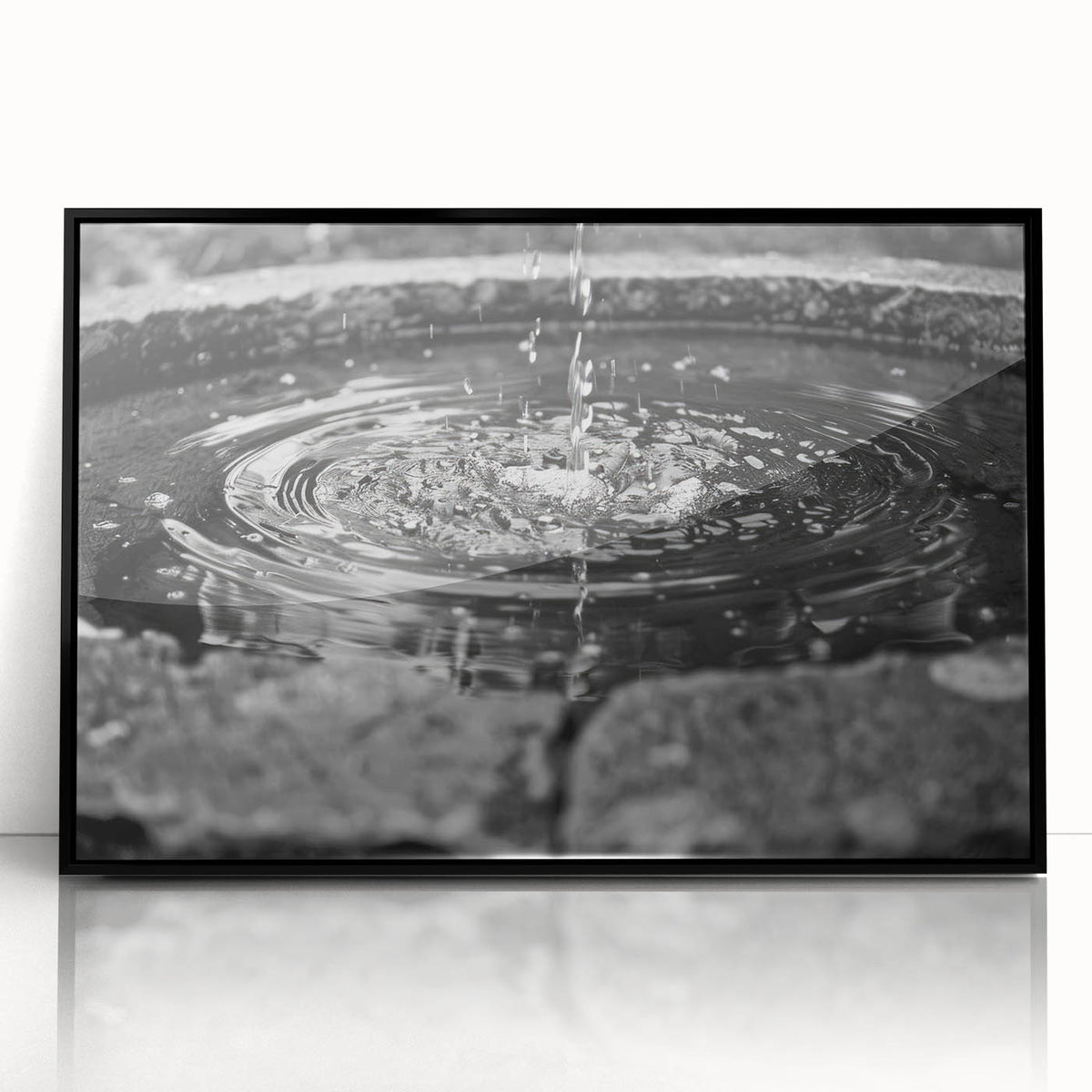 Large abstract wall art featuring a geometric fountain design in black and white tones, framed acrylic.