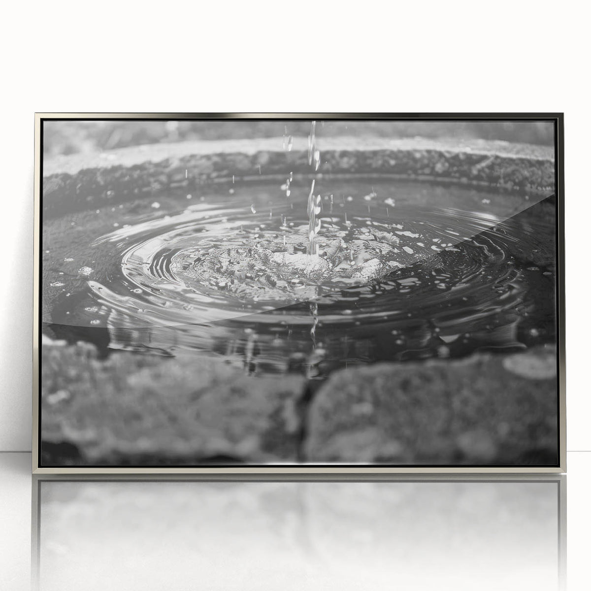 Mid-century modernist art of a silver framed acrylic print depicting an architectural fountain design in muted tones.