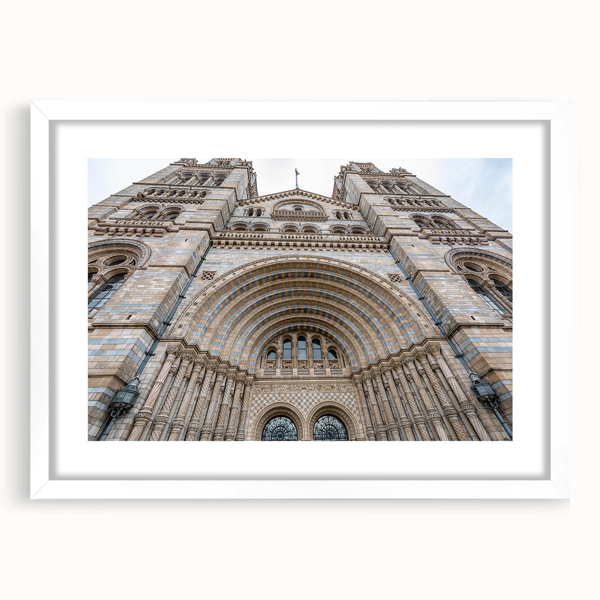 Extra large abstract art print featuring a textured design of a palace in muted earth tones, framed with a white mat.