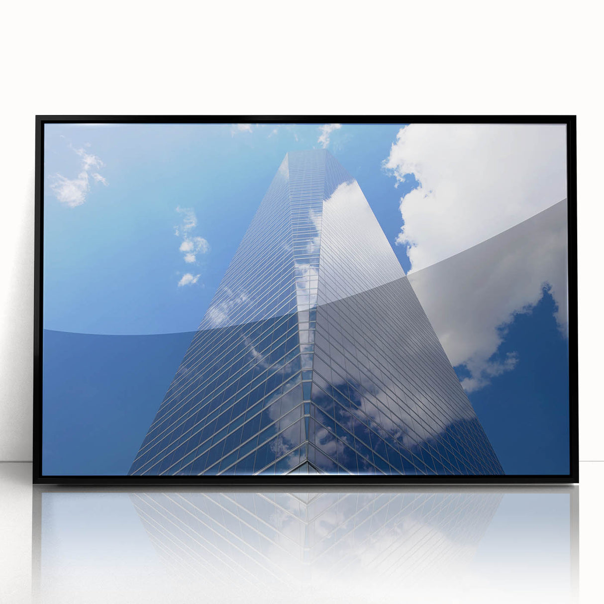 Large abstract wall art featuring a mid-century modernist skyscraper design in black, framed in acrylic.