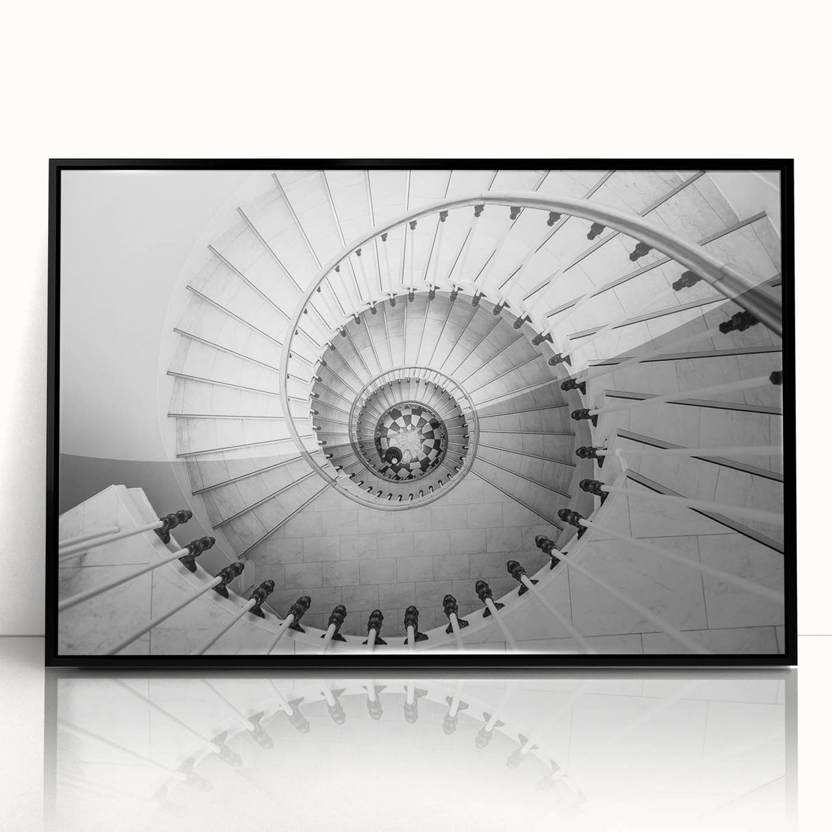 Large abstract wall art depicting a spiral staircase in black and white, framed in acrylic, suitable for modern decor.