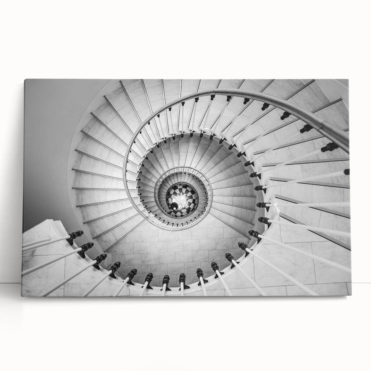 Black and white photograph of a spiral staircase on stretched canvas, suitable for kitchen or bedroom wall art.