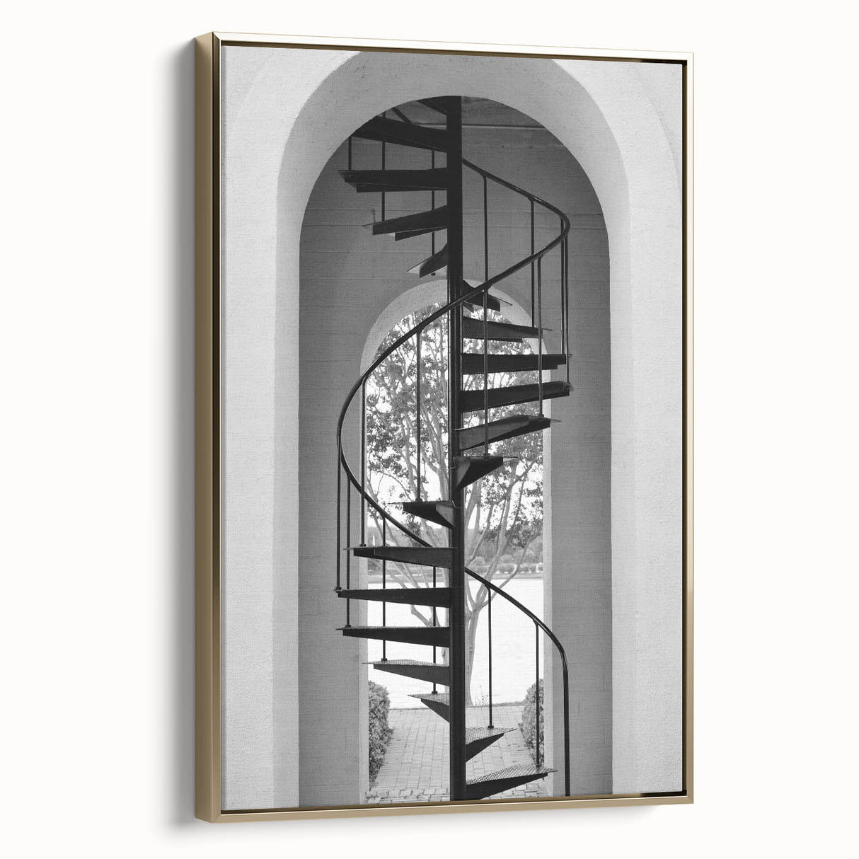Framed canvas featuring a vintage poster of a spiral staircase in black and white, ideal for bedroom wall art.