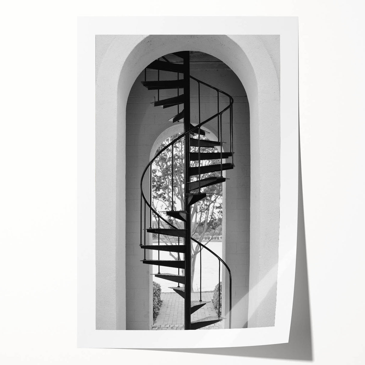 Spiral staircase design in monochrome on a rolled canvas, suitable as art wall in dining room.