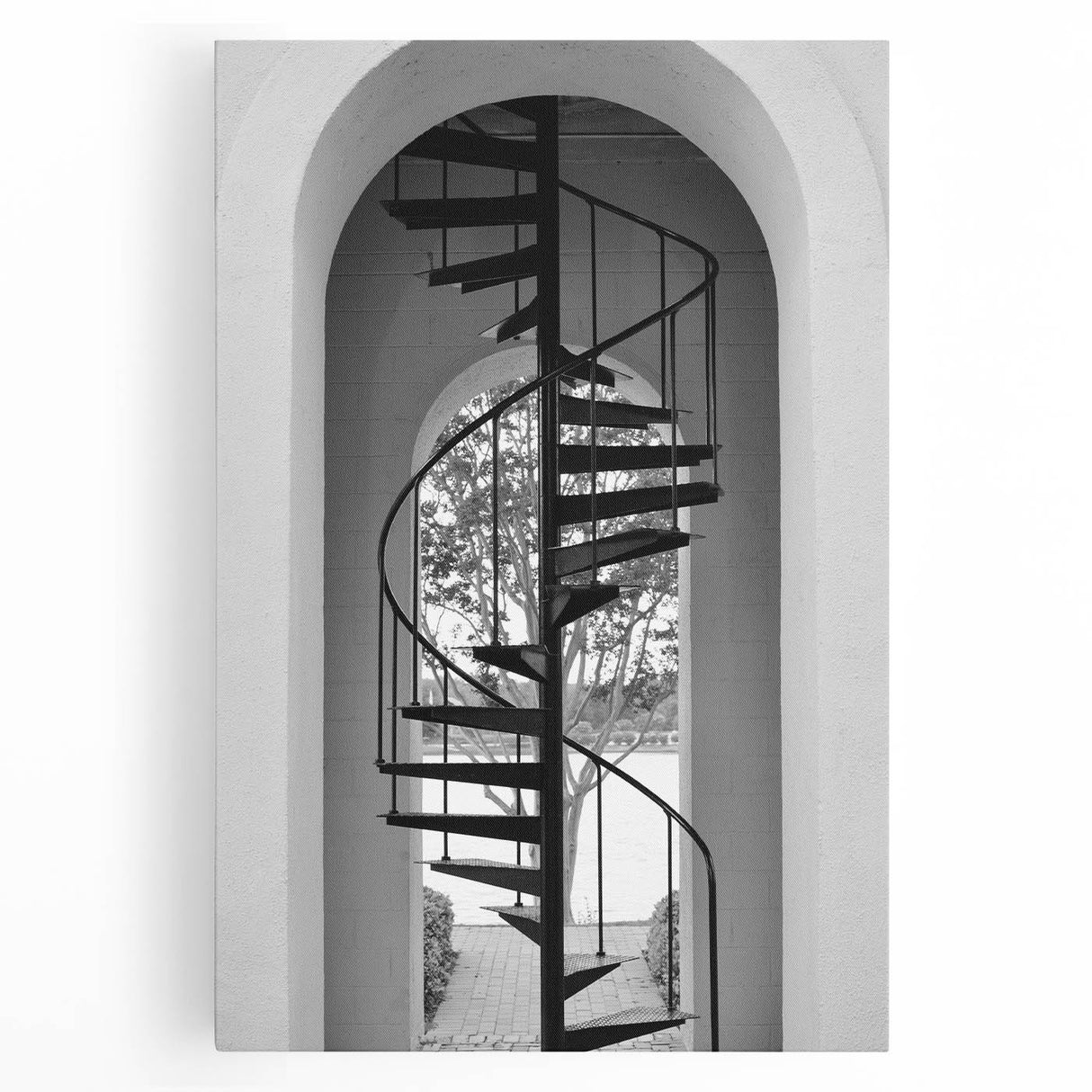 Black and white photograph of a spiral staircase on stretched canvas, suitable for kitchen wall art.