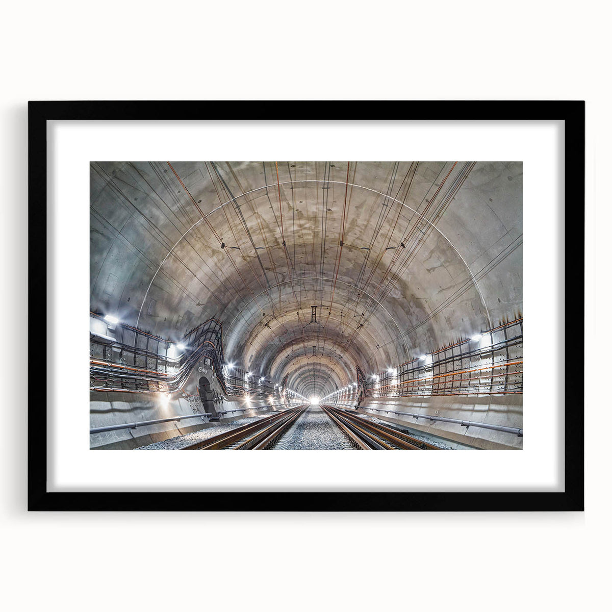 Extra large abstract art print featuring a colorful, textured depiction of architectural tunnels, in a black frame with mat.
