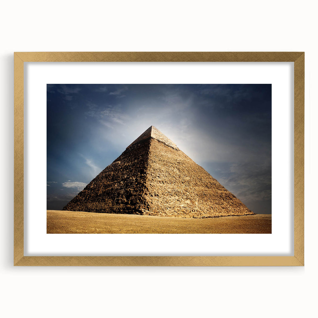 Textured abstract art print of an Egyptian landscape in gold and earth tones on a framed canvas, suitable for bedroom decor.