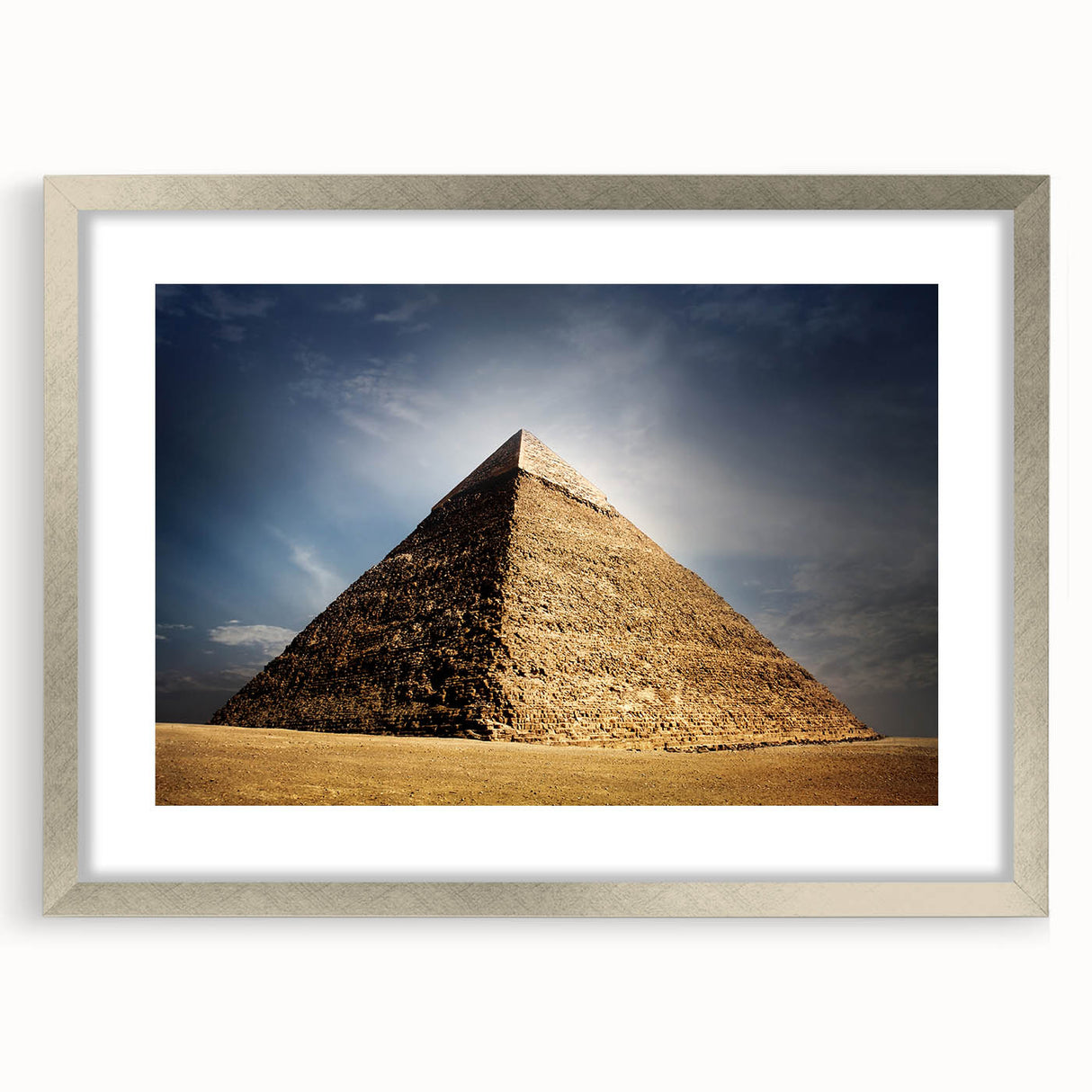 Abstract art print of an African desert scene in muted earth tones on a framed canvas, suitable for dining room decor.