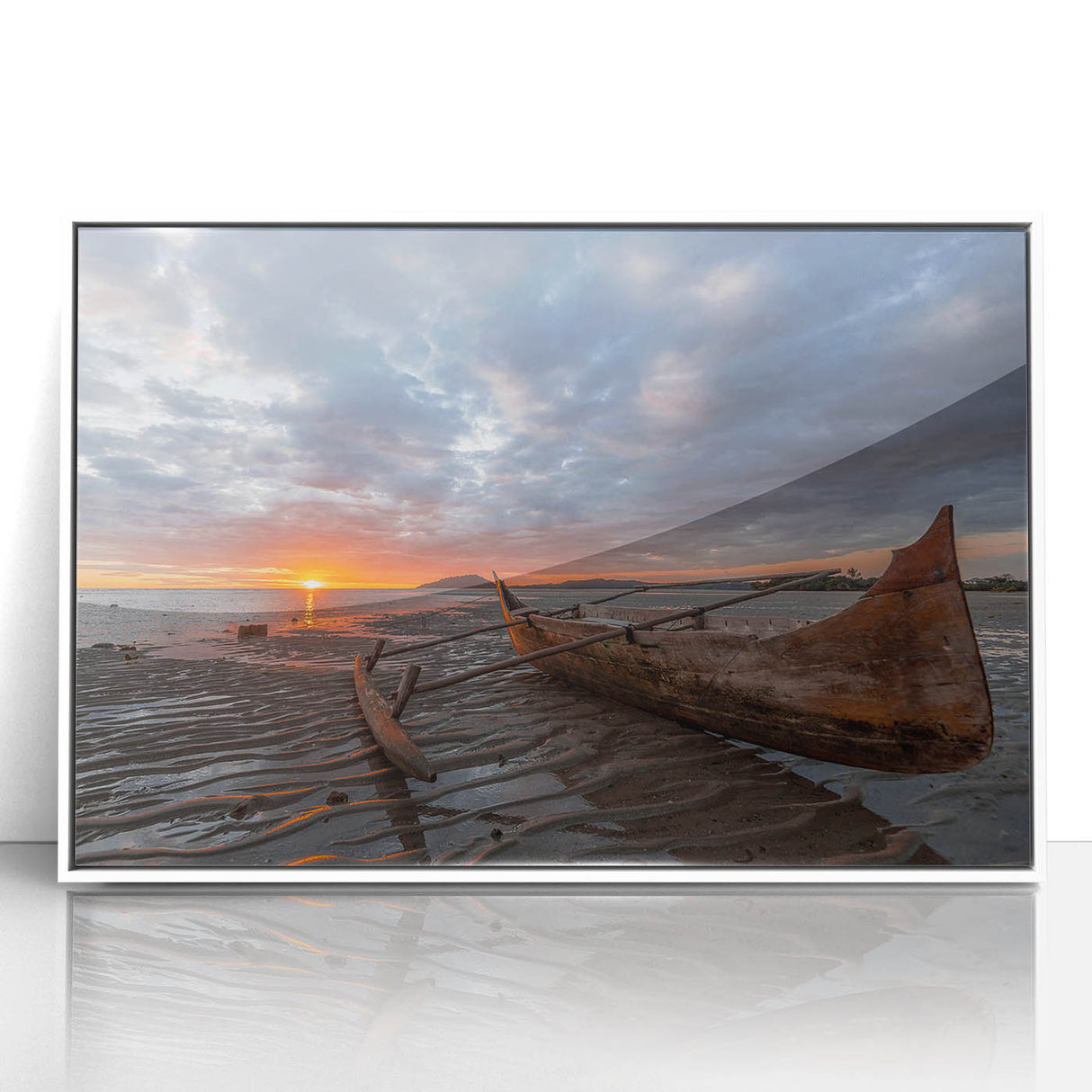 Large art print of a serene Madagascar landscape in soft green and blue tones, framed in white acrylic.