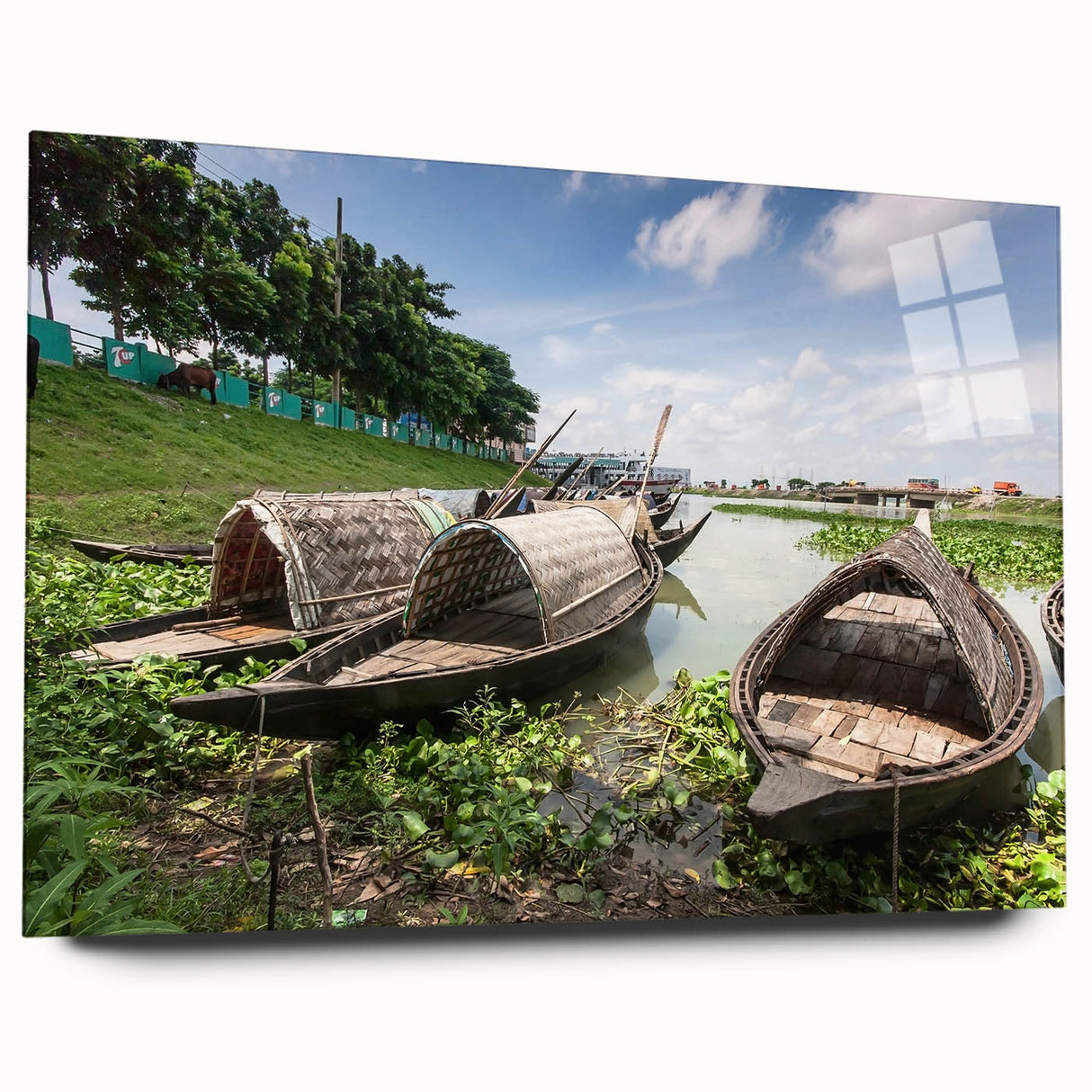 Large abstract wall art featuring a serene Bangladesh landscape in soft green and blue tones on acrylic glass.