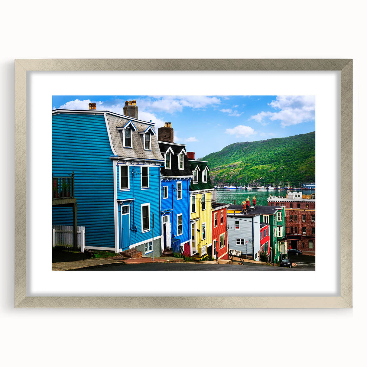 Textured abstract art print of a Newfoundland scenery in muted earth tones, framed with a silver mat.