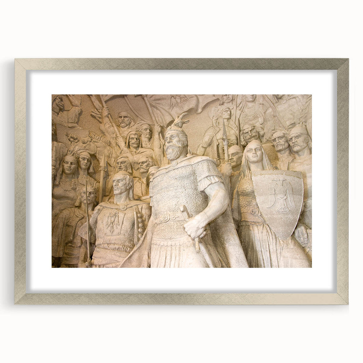 Textured art print of an abstract European scenery in muted earth tones, framed in silver, ideal for bedroom decor.