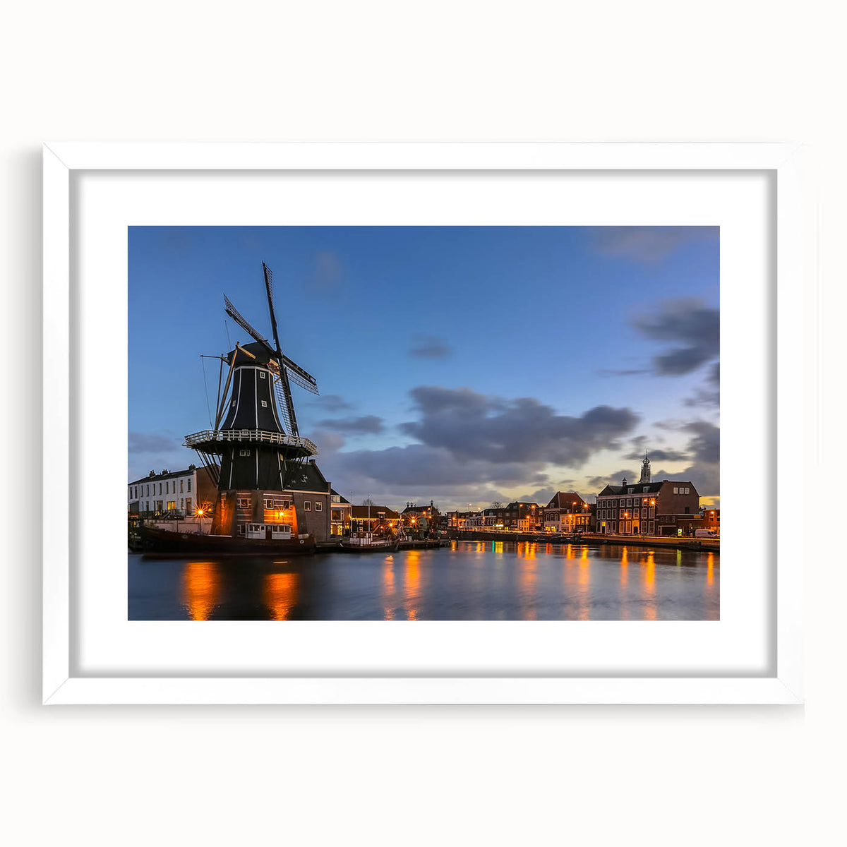 Textured art of Amsterdam scenery in abstract style, featuring muted earth tones on a framed white mat.