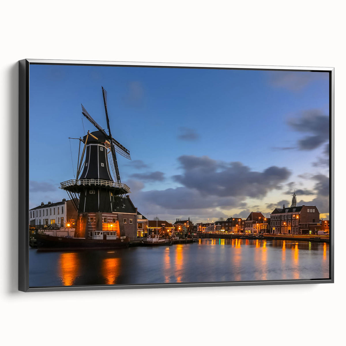 Black and white framed canvas of Amsterdam landscape, ideal for bedroom wall decor.