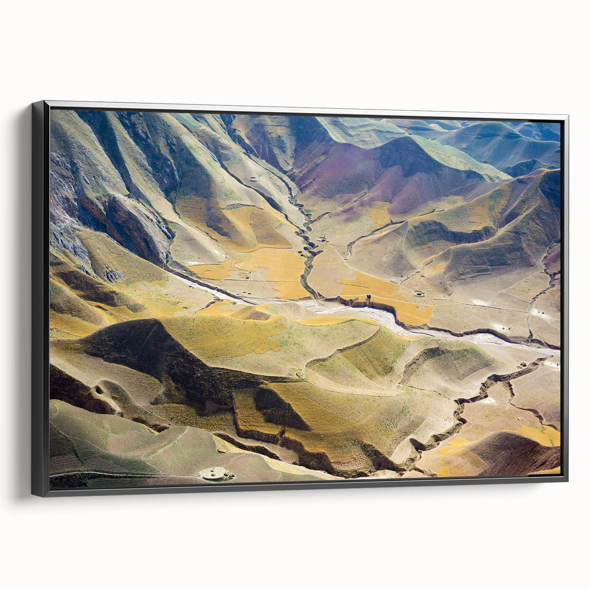Black and white framed canvas featuring a vintage-style landscape painting of an Afghan scenery, ideal for bedroom wall art.