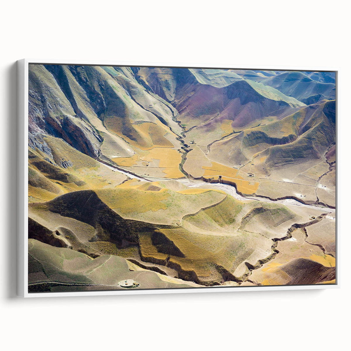 Vintage poster art of a Middle Eastern scenery on a framed canvas.