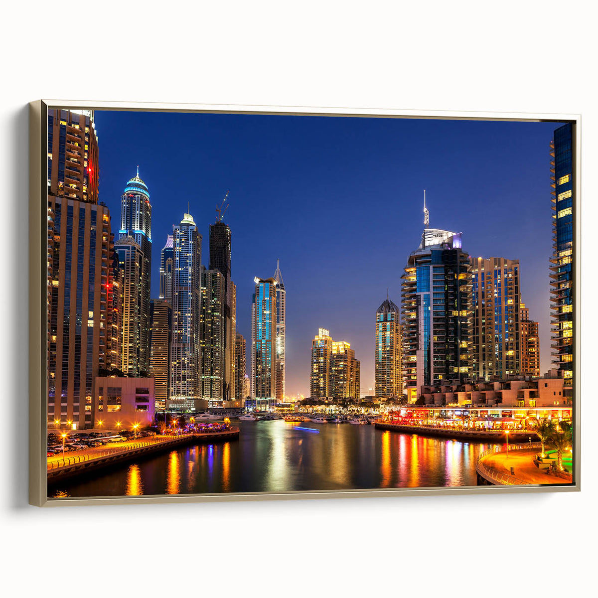 Framed canvas wall art of Dubai skyline in gold and black tones, ideal for bedroom ambiance.