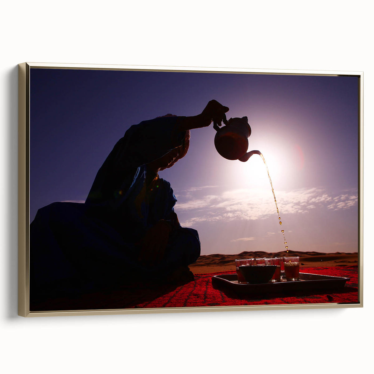 Framed canvas wall art depicting a vintage-style landscape of a Middle Eastern scene, in muted gold and black tones.