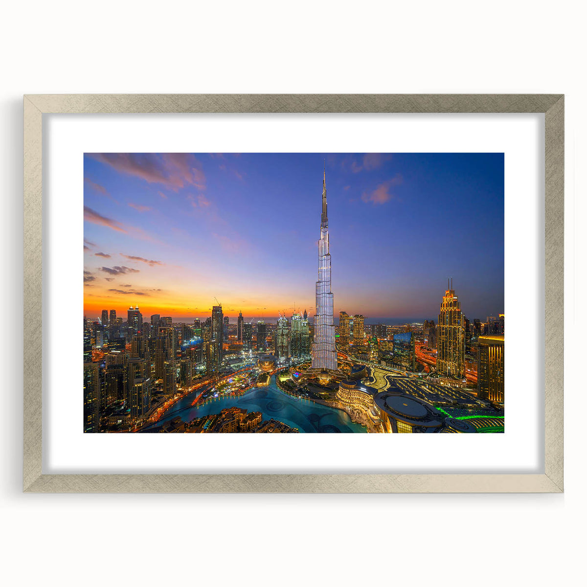 Textured art print of Burj Khalifa in abstract style with silver frame, ideal for modern bedroom ambiance.