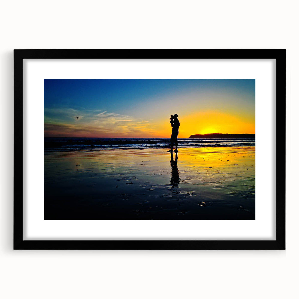 Extra large colorful abstract art print of a Californian scenery on a textured canvas, framed in black.