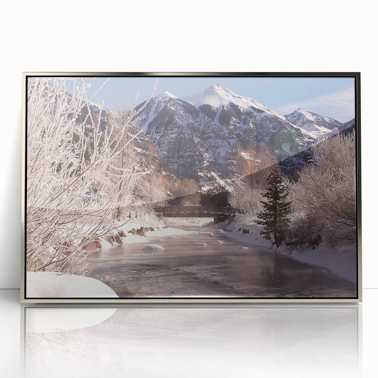 Mid-century modernist art depicting Telluride, Colorado scenery in muted earth tones on a silver-framed acrylic print.