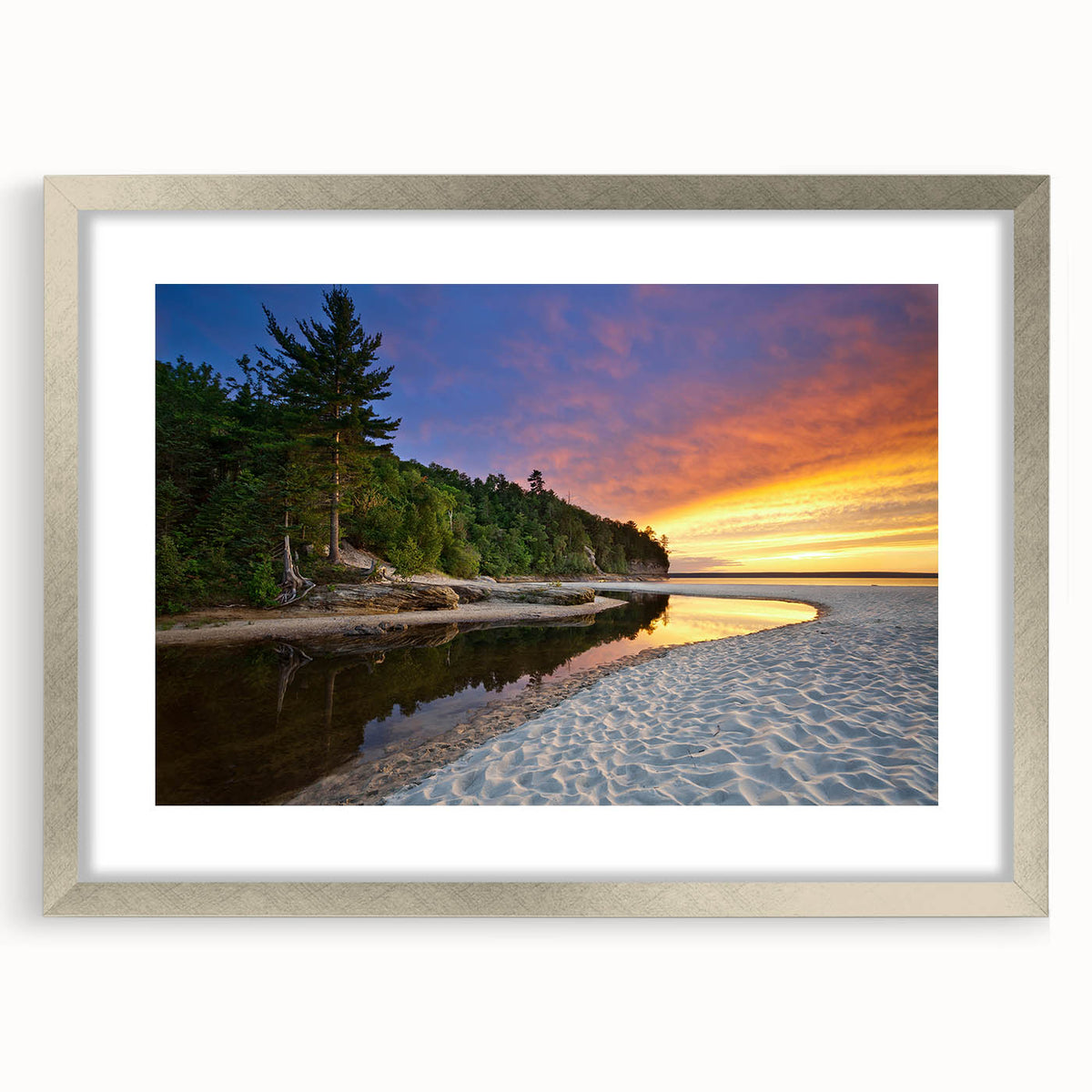 Textured art of abstract Lake Michigan scene in muted blue and gray, framed in silver, ideal for bedroom art.