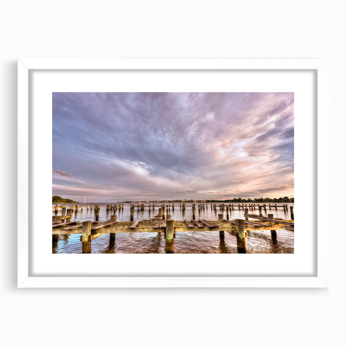 Abstract art print of Annapolis, Maryland, with muted blue and green hues on a framed white mat, ideal for dining room decor.