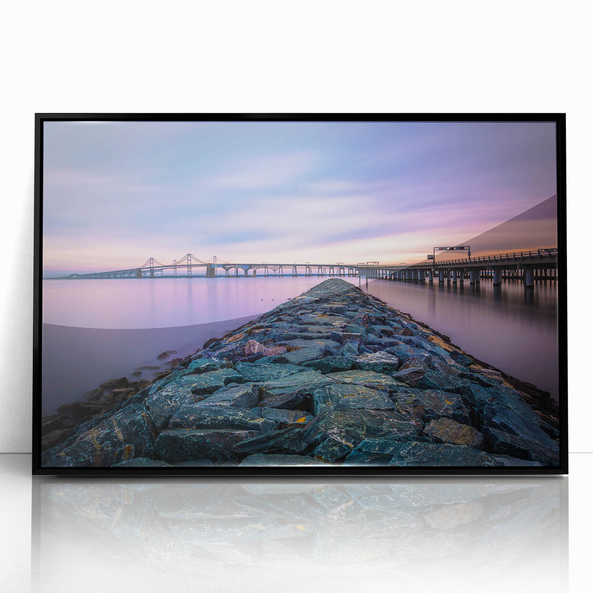 Large abstract wall art depicting Chesapeake Bay in muted blue tones, framed in black acrylic.