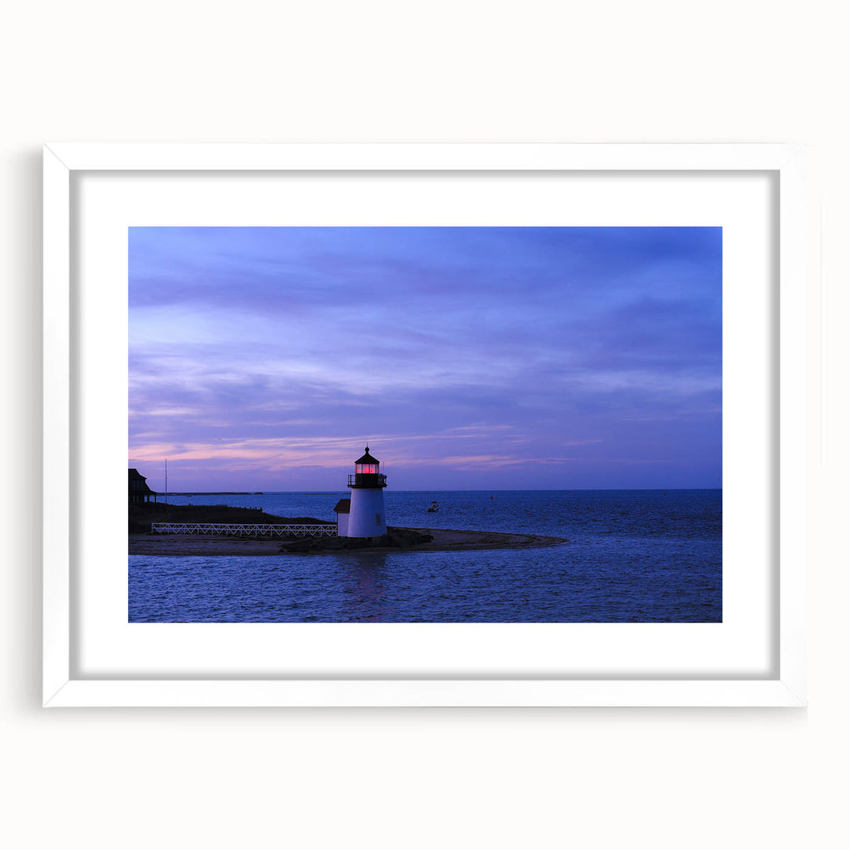 Abstract art print of Nantucket scenery in muted blue and white tones, framed with a white mat.