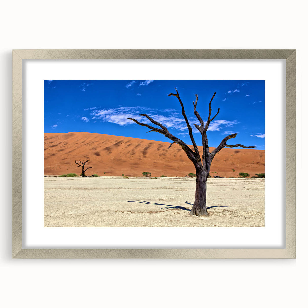 Abstract art print of an African landscape in muted earth tones on a framed canvas, suitable for dining room decor.