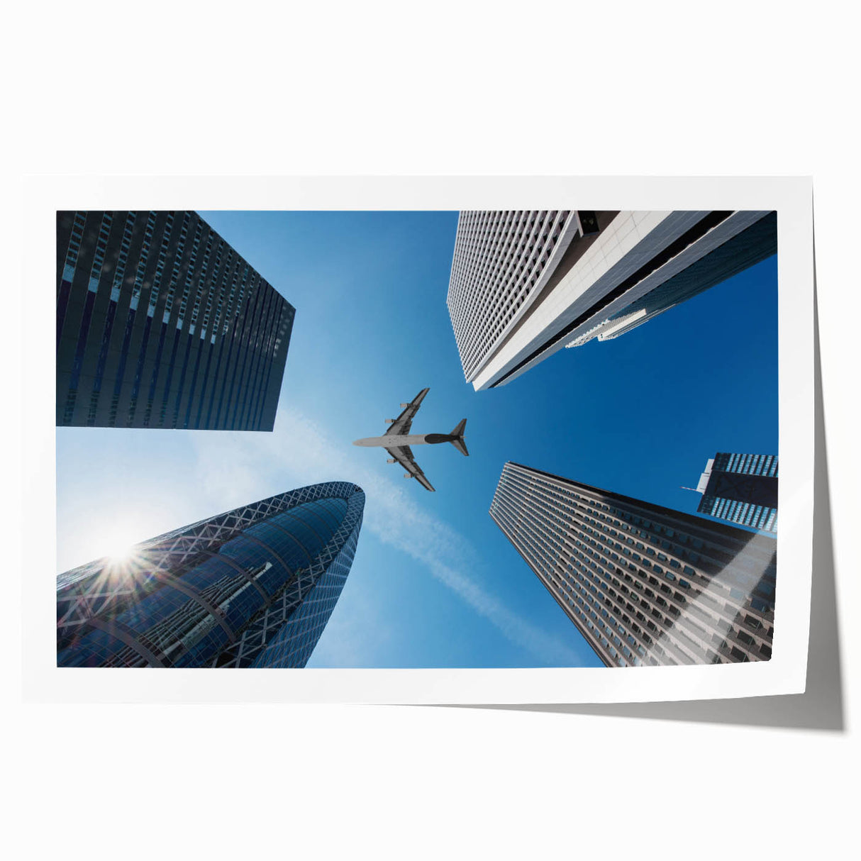 Extra large rolled print featuring Tokyo skyline with soft pink cherry blossoms, ideal for art wall dining room.