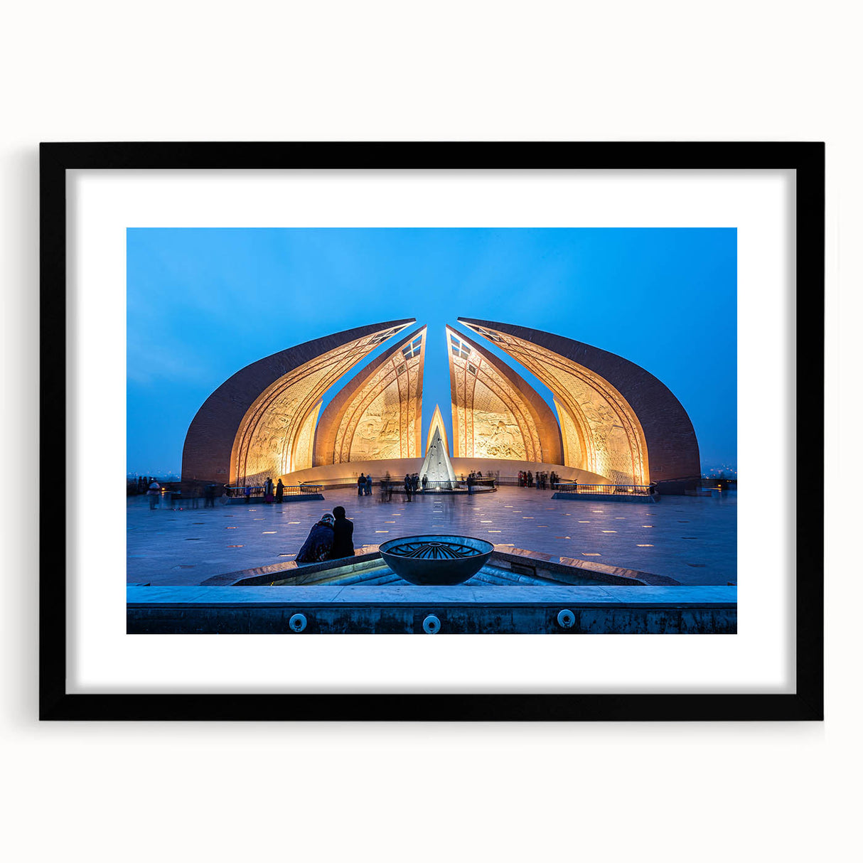 Extra large abstract art print featuring colorful, textured scenery of a Pakistani landscape on a black framed canvas.