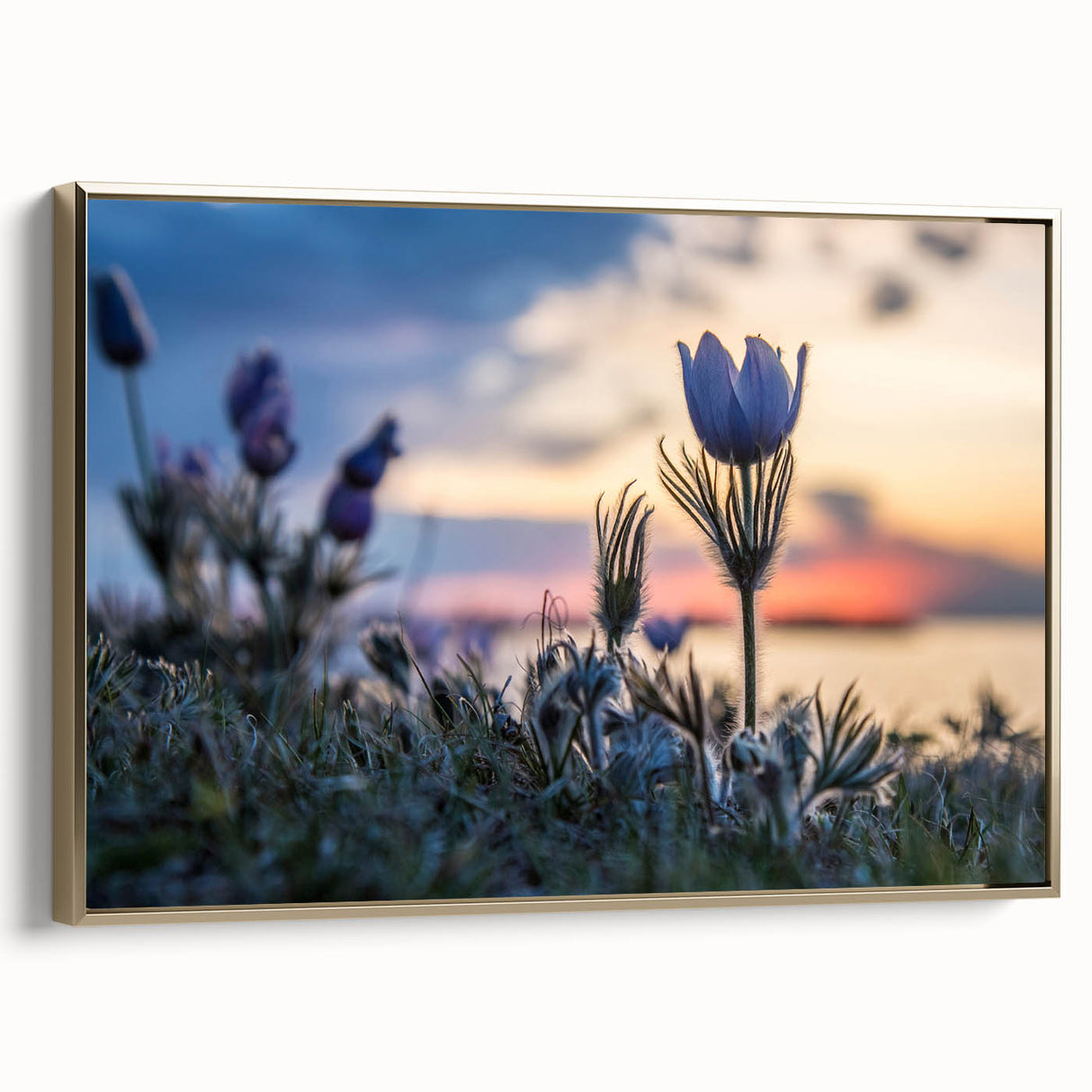 Framed canvas wall art featuring a vintage landscape painting of Manitoba, Canada, with muted earth tones.