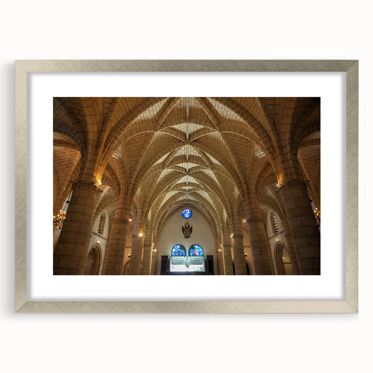 Extra large abstract art print of a Caribbean scenery in muted blue and green tones, framed in silver.