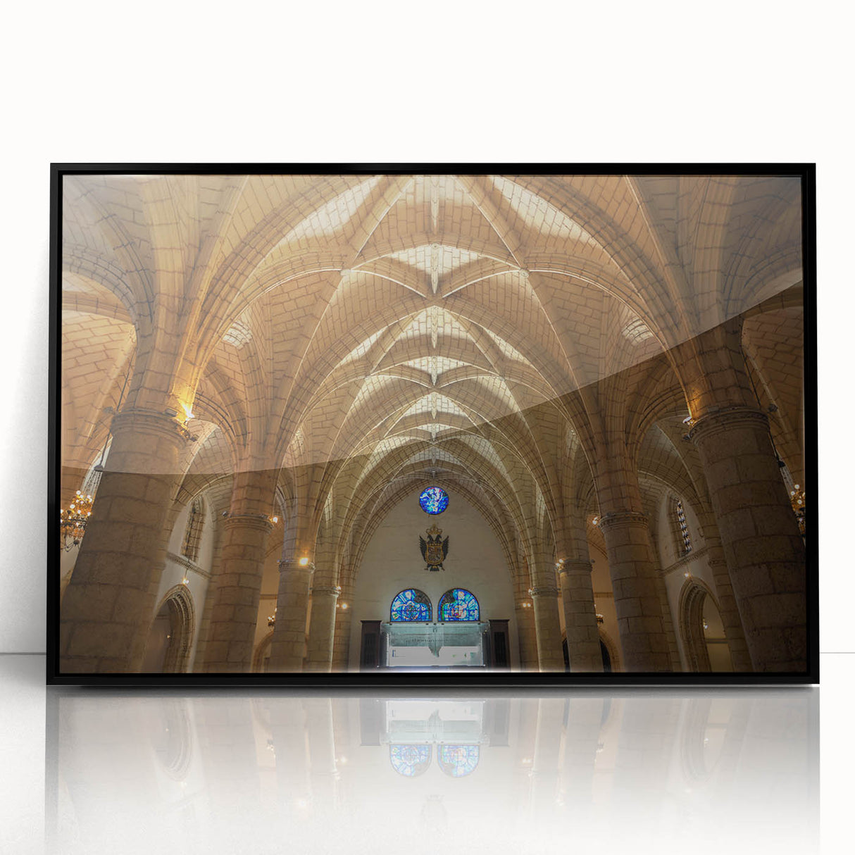 Large abstract wall art depicting a Caribbean scene in muted blues and greens on a framed acrylic.