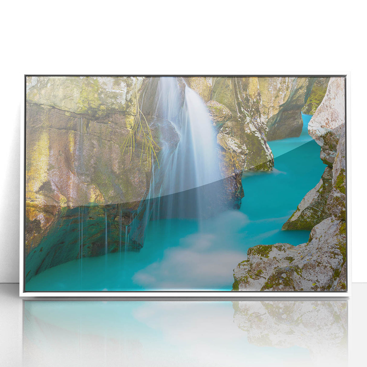 Large art print of a Slovenian landscape in muted green and blue tones, framed in white acrylic.