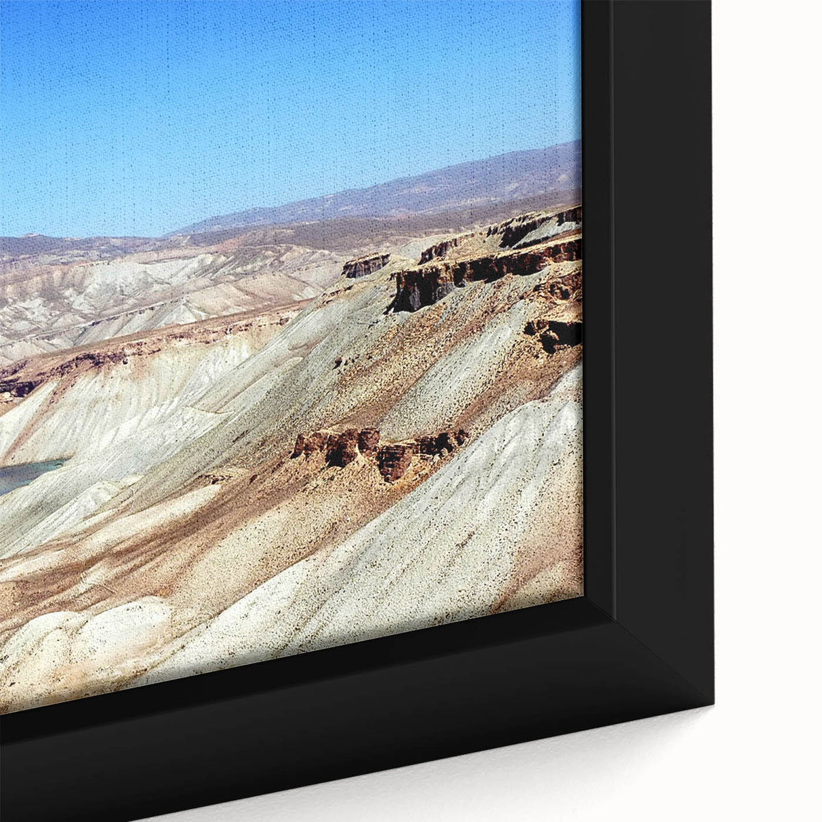 Extra large framed canvas featuring a textured black wall art with colorful Middle Eastern scenery.