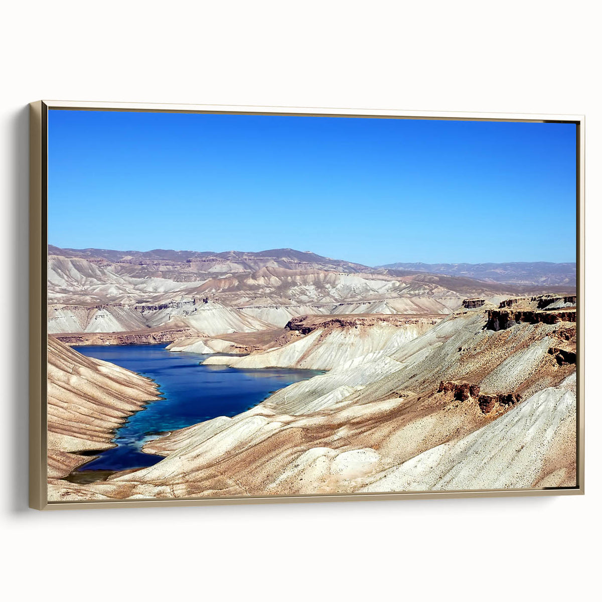 Framed canvas depicting a vintage-style landscape of Afghanistan with muted gold and black tones, ideal for bedroom wall art.