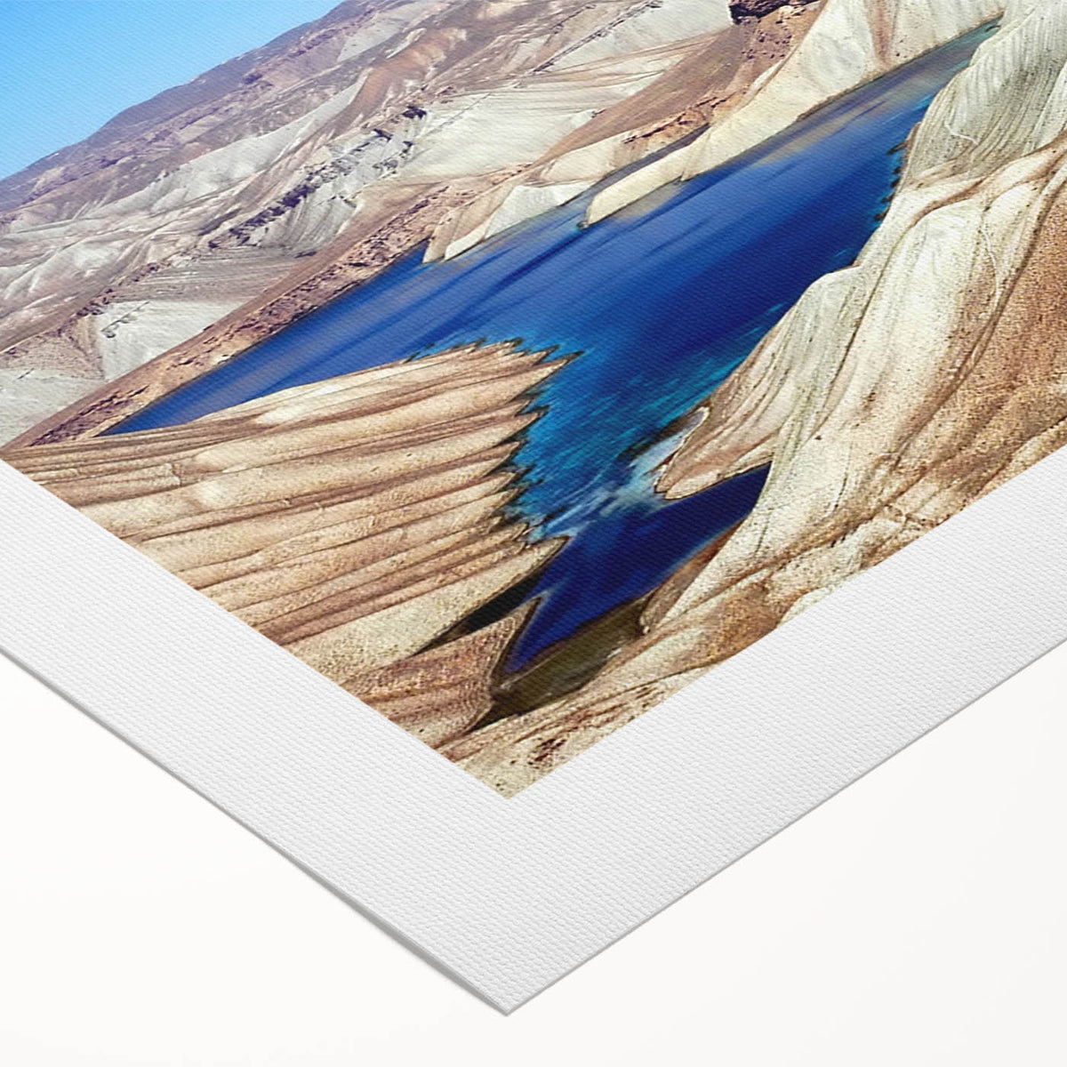 Art deco poster of a Middle Eastern landscape on rolled canvas, featuring earthy and muted tones.