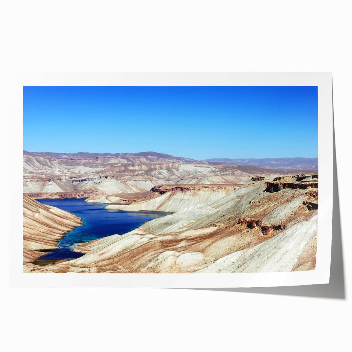 Extra large rolled print depicting a Middle Eastern scenery with muted earth tones.