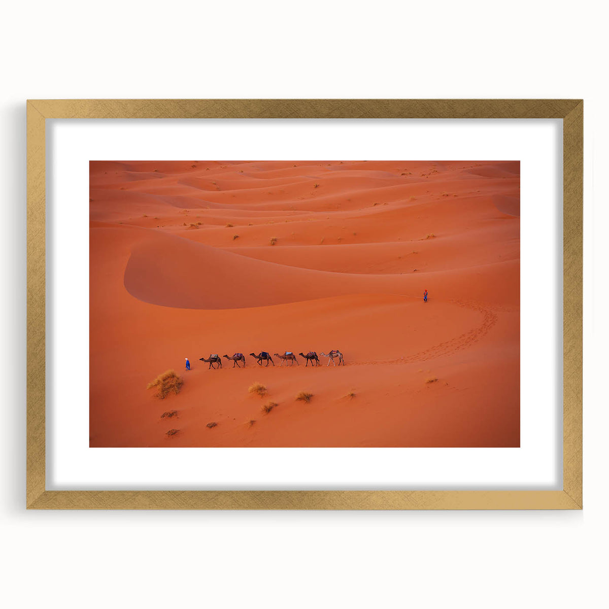 Extra large abstract art print featuring textured scenery of a Middle Eastern landscape in muted earth tones, framed in gold.