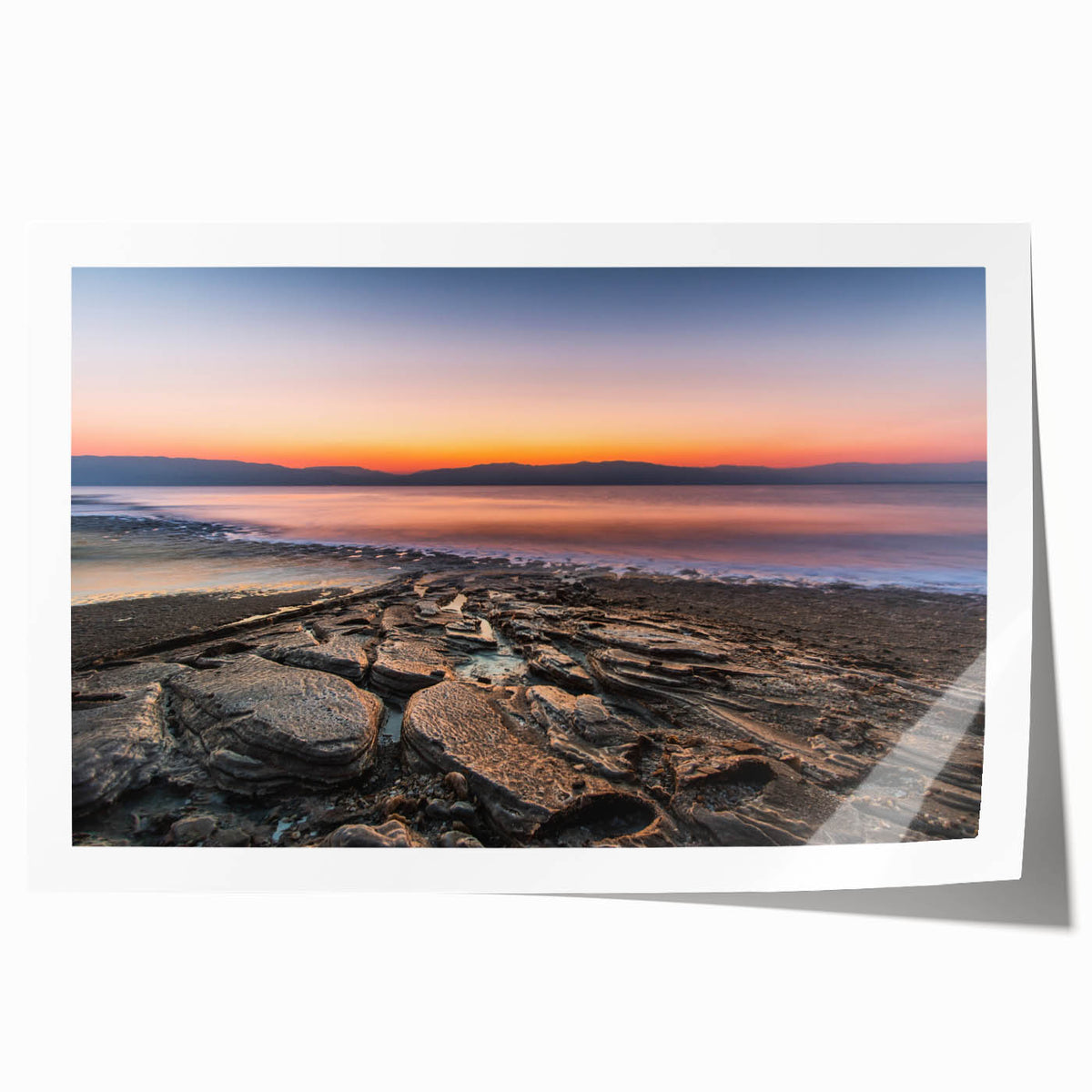Rolled print of the Dead Sea with muted blue and sandy hues, ideal for art wall dining room.
