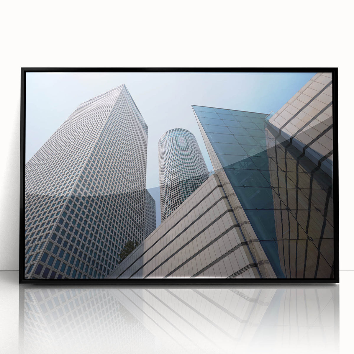Large abstract wall art depicting Tel Aviv skyline in muted gray and blue tones on framed acrylic.
