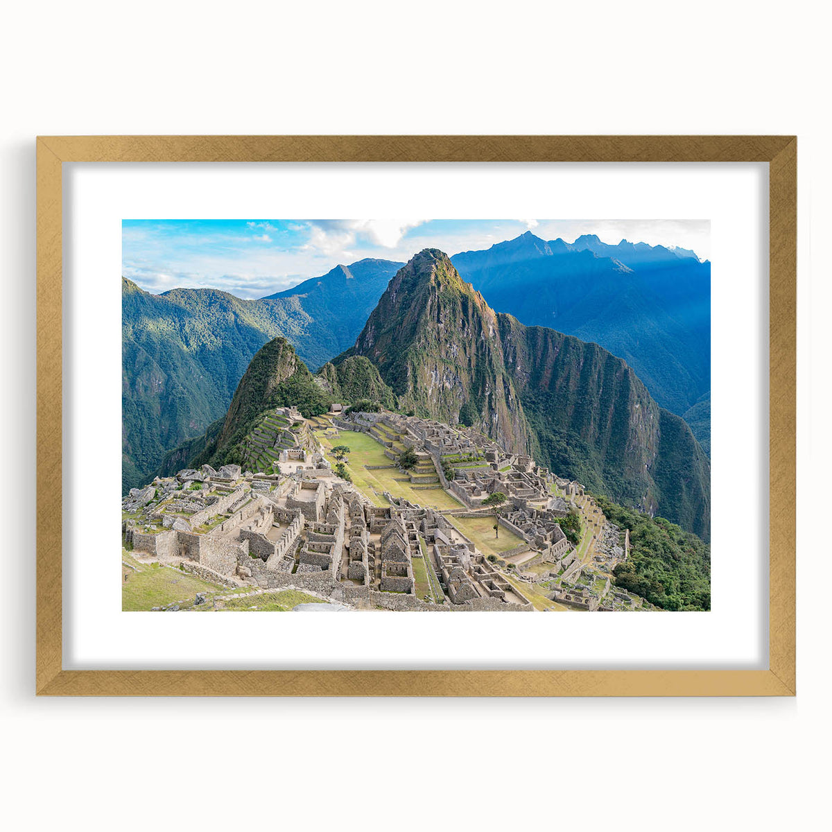 Extra large wall art of Machu Picchu in muted earth tones, framed in gold, ideal for living room decor.