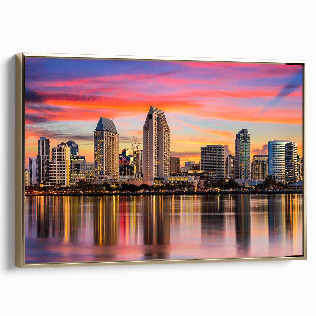 Framed canvas wall art featuring a vintage-style landscape painting of Coronado, California, in muted golden and black tones.