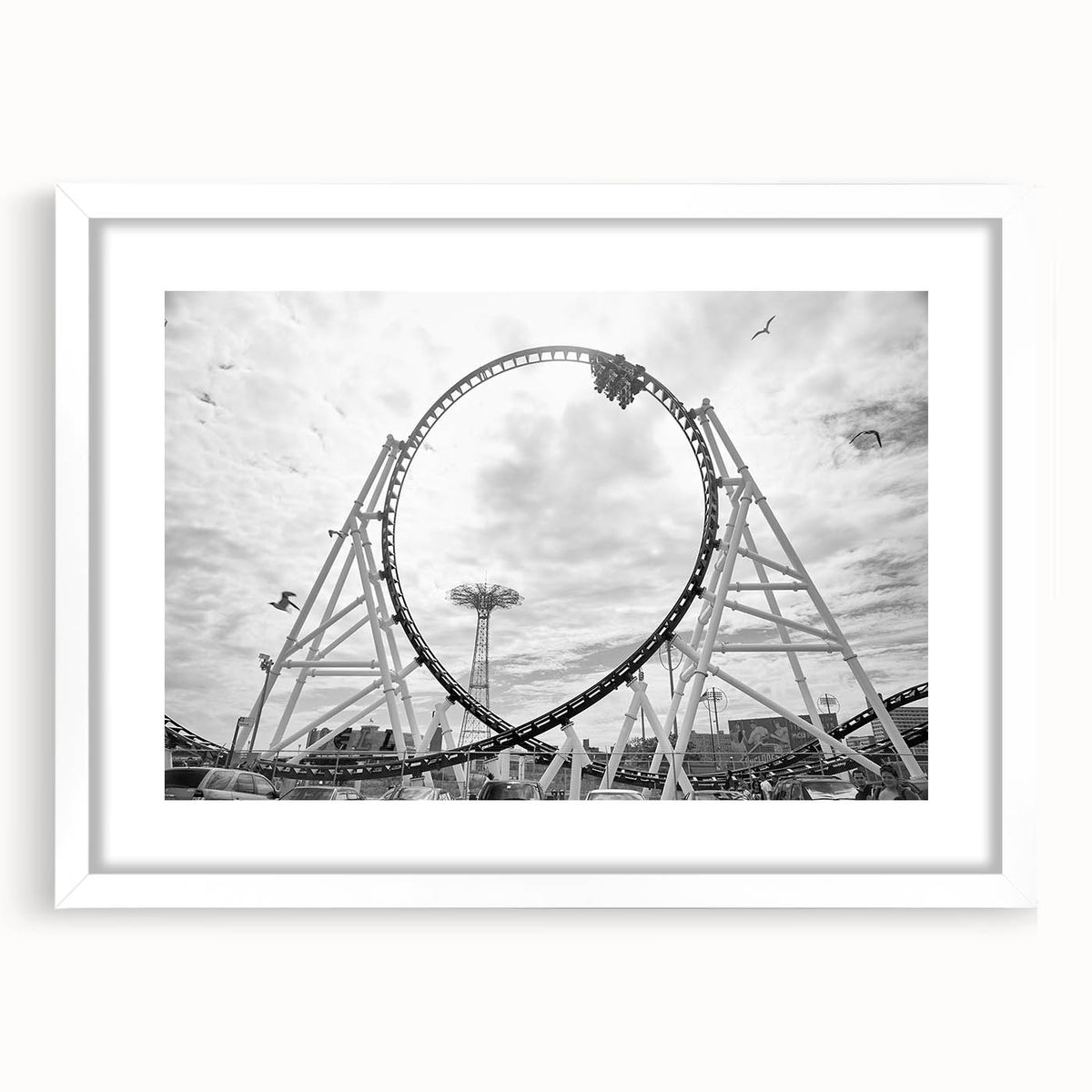 Abstract art print of Coney Island in muted gray and blue tones, presented in a white framed poster.