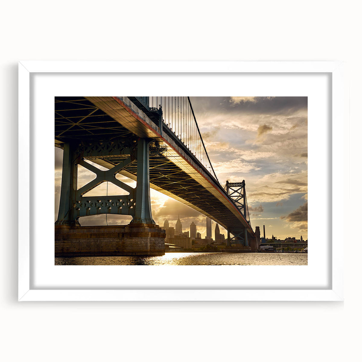 Abstract art print of Philadelphia skyline in muted blue and gray tones on a framed white mat, ideal for dining room decor.