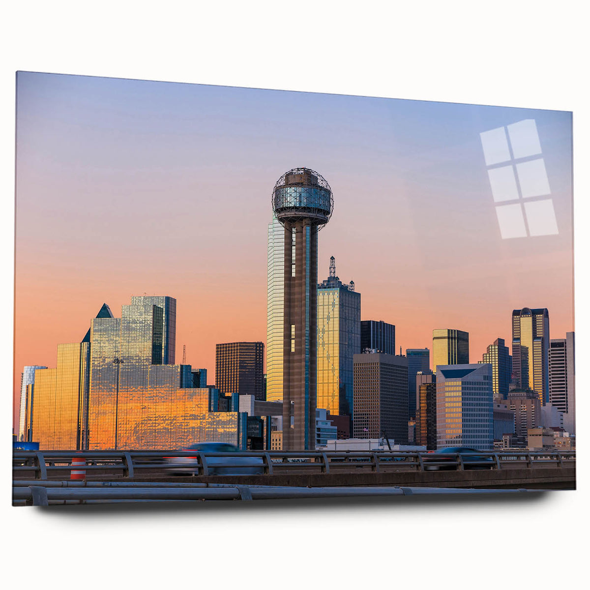 Large abstract wall art of Dallas skyline in muted blue and gray tones on acrylic glass.