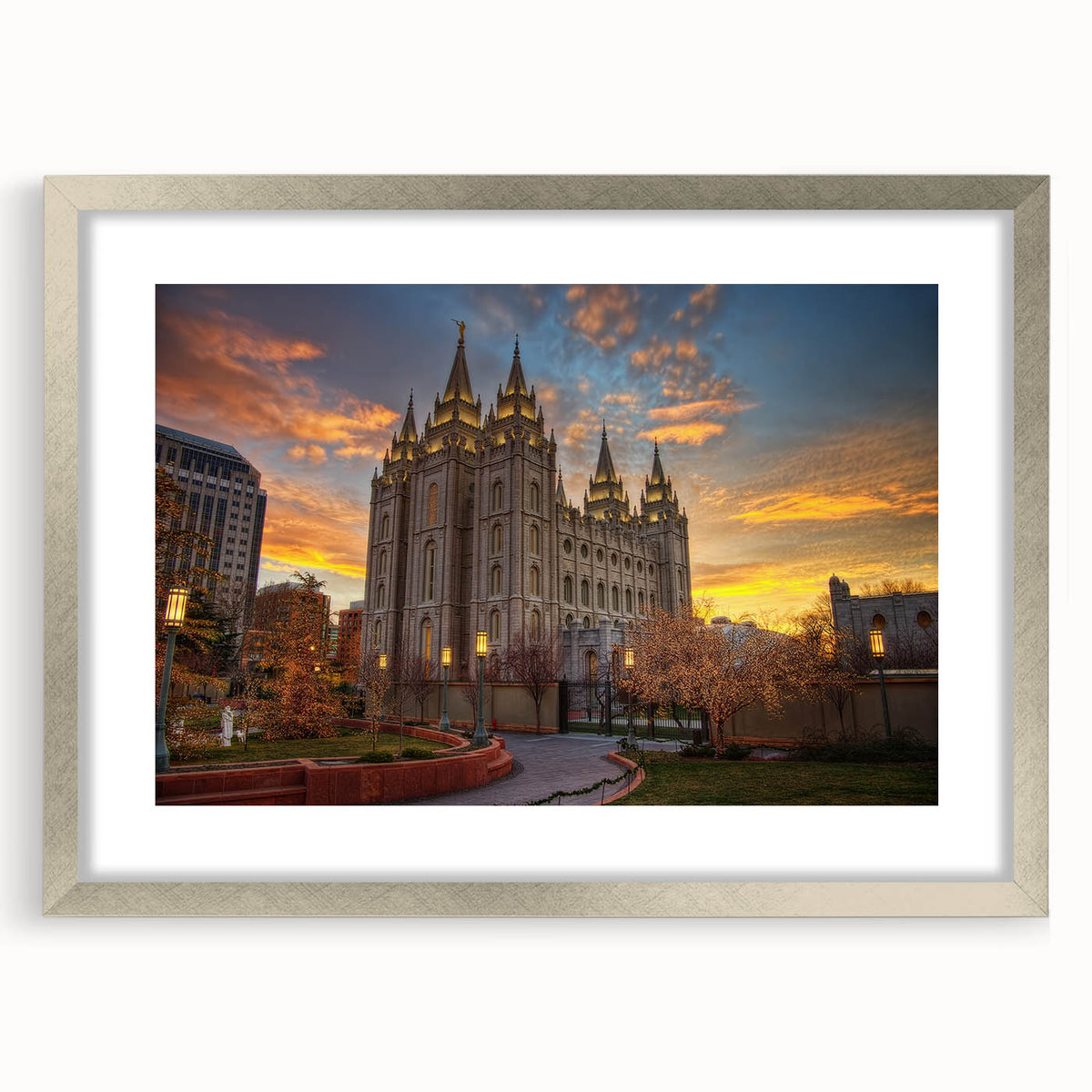 Textured art print of Salt Lake City with abstract elements in muted earth tones, framed in silver, ideal for bedroom decor.